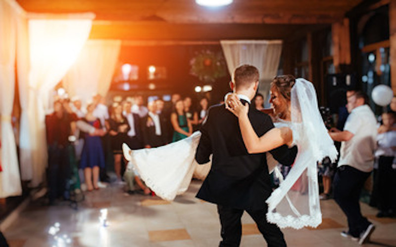 Utah couple sharing a special moment at their wedding reception